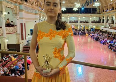 happy child at ballroom dance competition in Blackpool